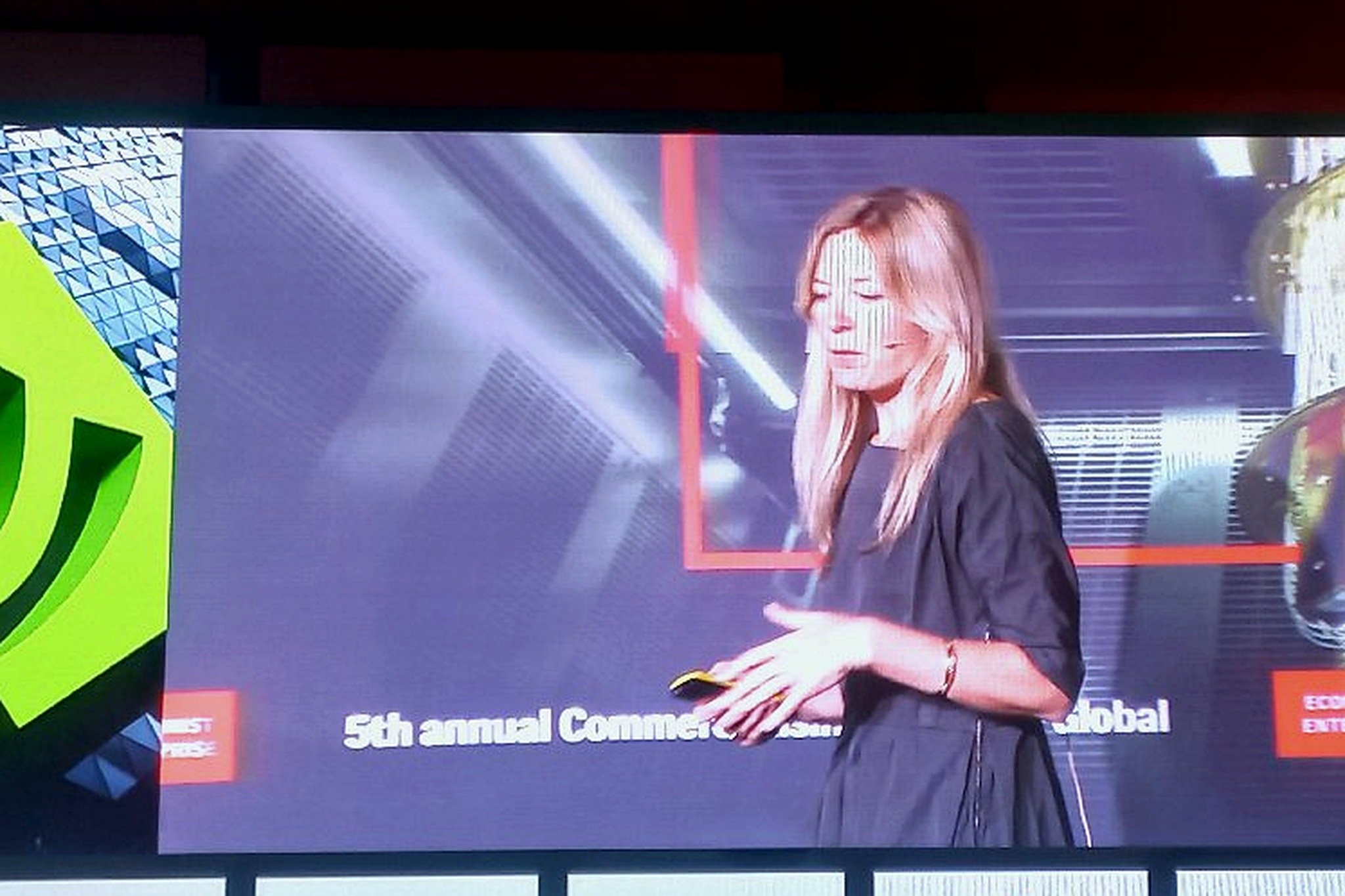 Speaker presenting on AI and quantum computing convergence.